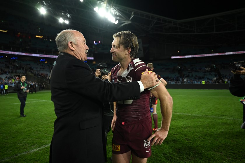 Cameron Munster is congratulated by Rugby League Immortal Wally Lewis, the most famous Maroon to wear the No.6 jersey.