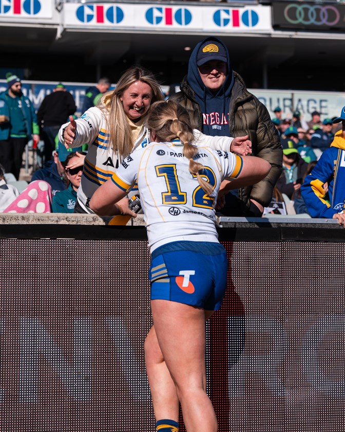 England secondrower Paige Travis celebrates with her mum, Debbie, after the Eels win in Canberra.